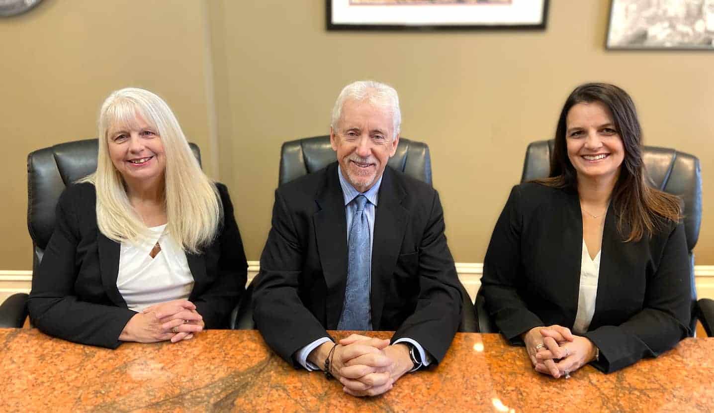 Teri Appelbaum, Matthew Padberg and Nicole Burlison Knepper at a Conference Table