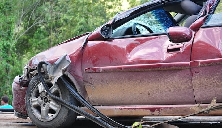 Red vehicle that was involved in a car accident.